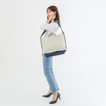 TUTUMU　News paper【豊岡鞄】
